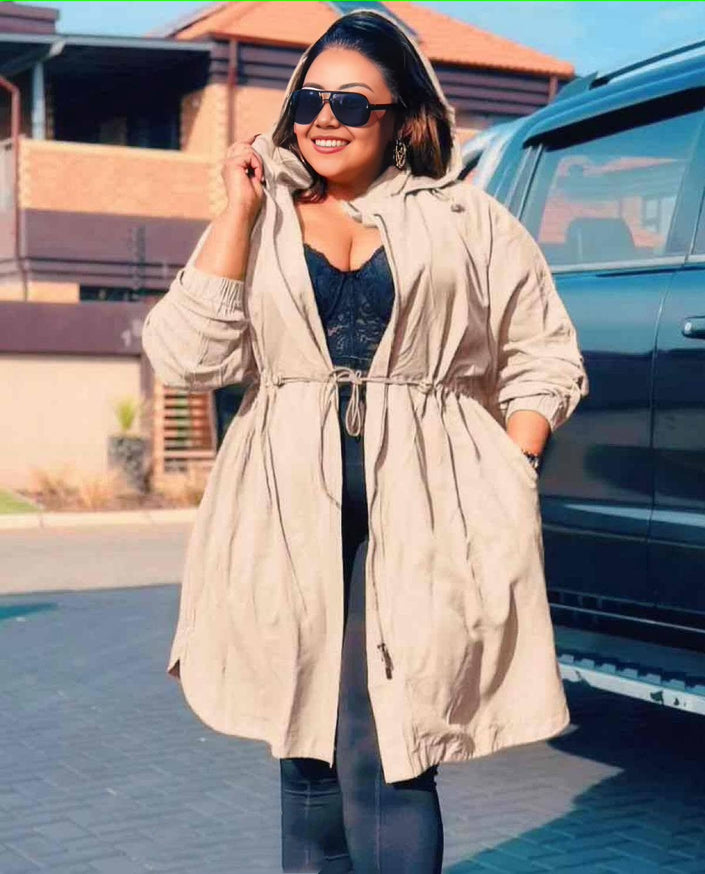 Lightweight cream trench coat with drawstring waist and long sleeves