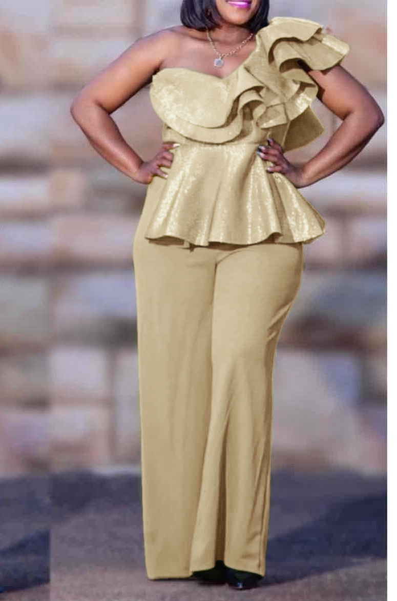 One-shoulder ruffle jumpsuit in beige, wide-leg trousers with layered shoulder peplum.