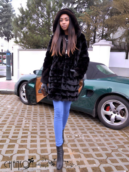 Black hooded fur coat, full-length with zip front and plush textured panels