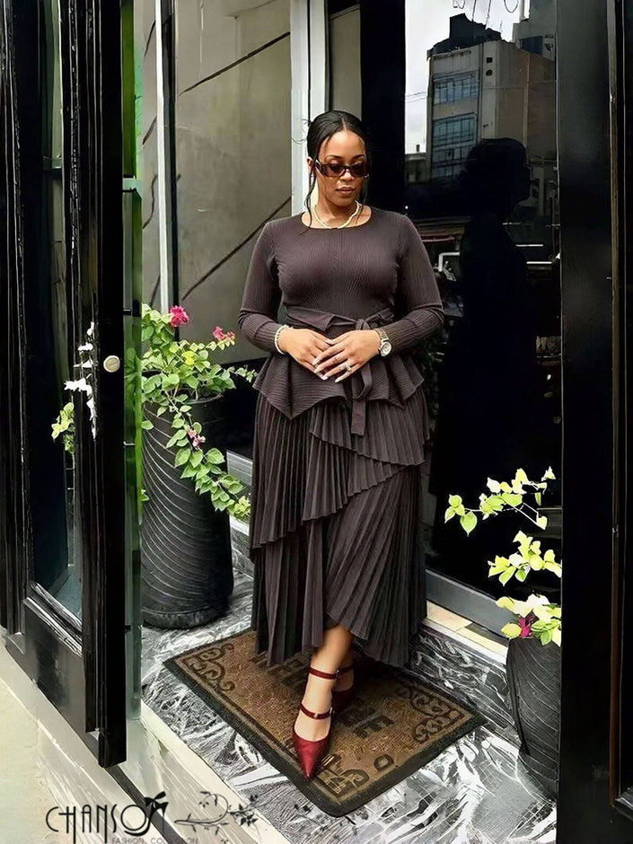 Mauve long-sleeve peplum top and pleated asymmetric maxi skirt two-piece set