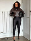 Cropped oversized brown jacket with stand collar, zip front, asymmetric stitching