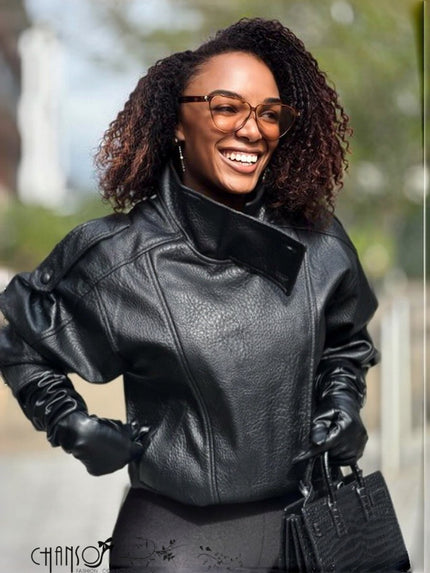 Cropped black leather jacket with wide stand collar and zipper at front