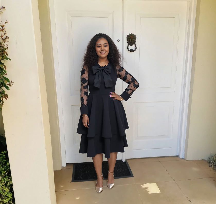 Black lace puff-sleeve layered midi dress with neck bow