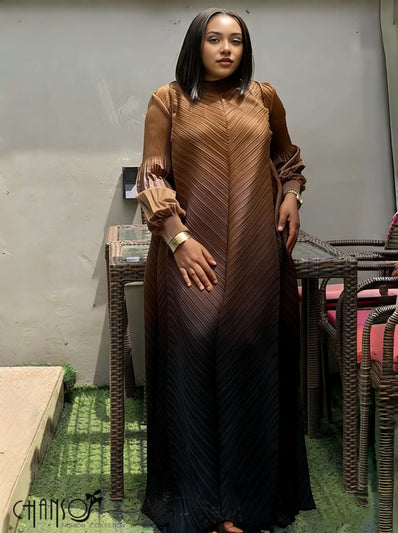 Pleated maxi dress with brown gradient, long puff sleeves, V-neck