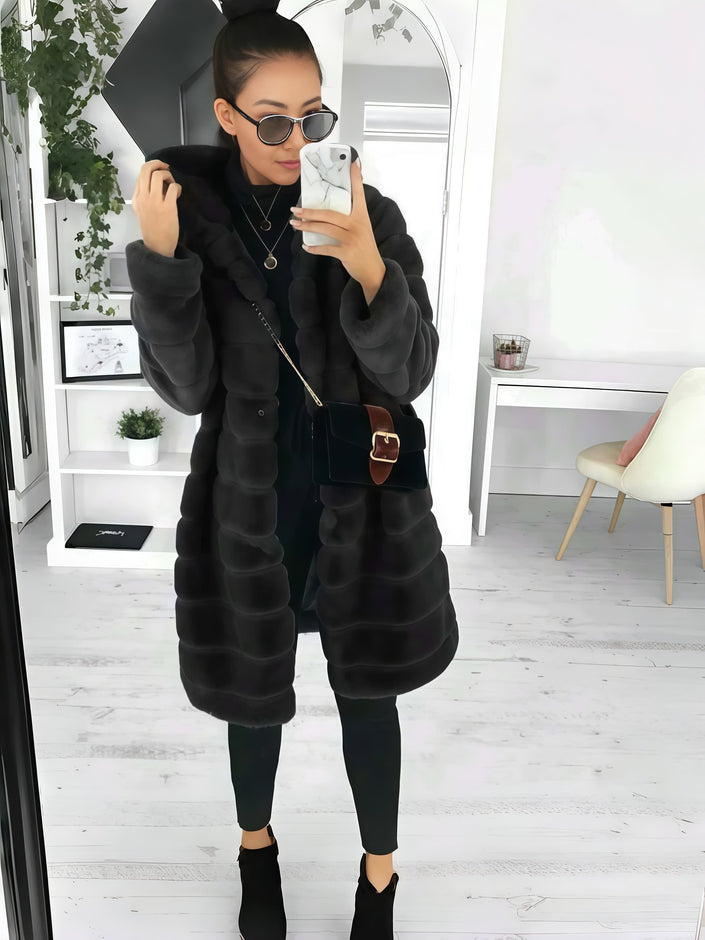Long black fur hooded coat with full-length sleeves and open front