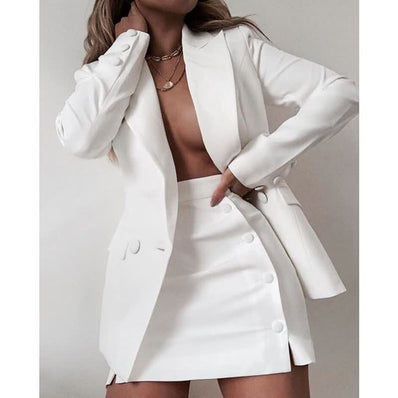 White blazer dress set with notched lapels and matching mini skirt, buttoned front.