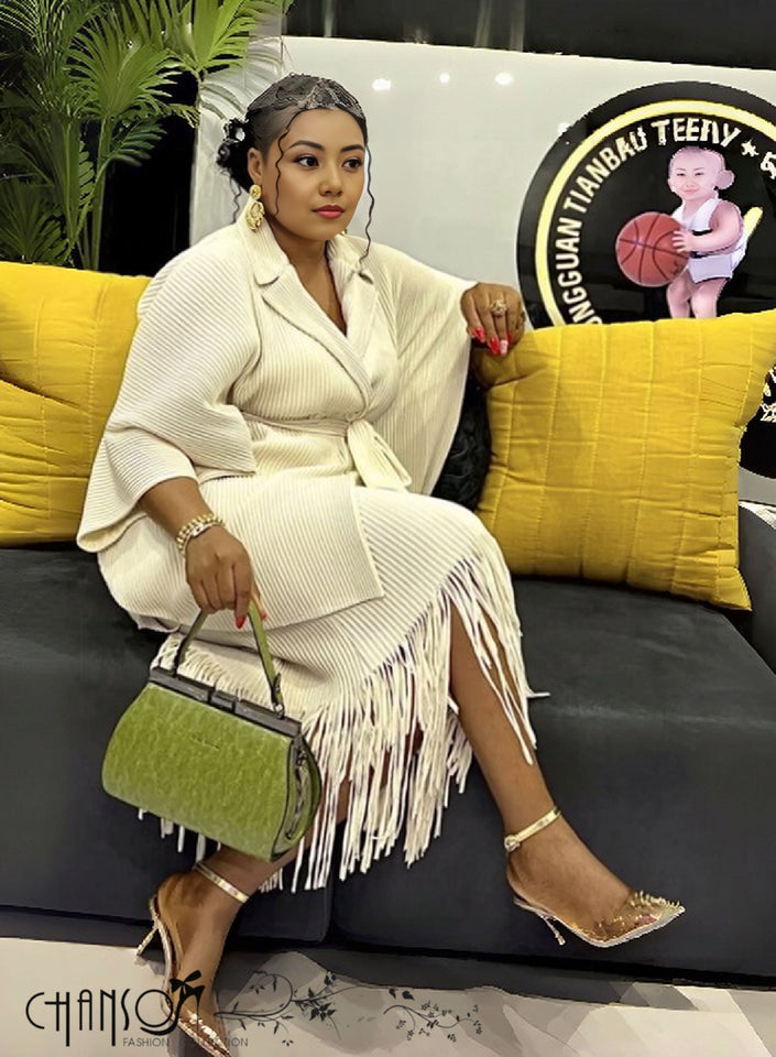 Beige twin set: pinstripe button shirt with fringe, pleated skirt