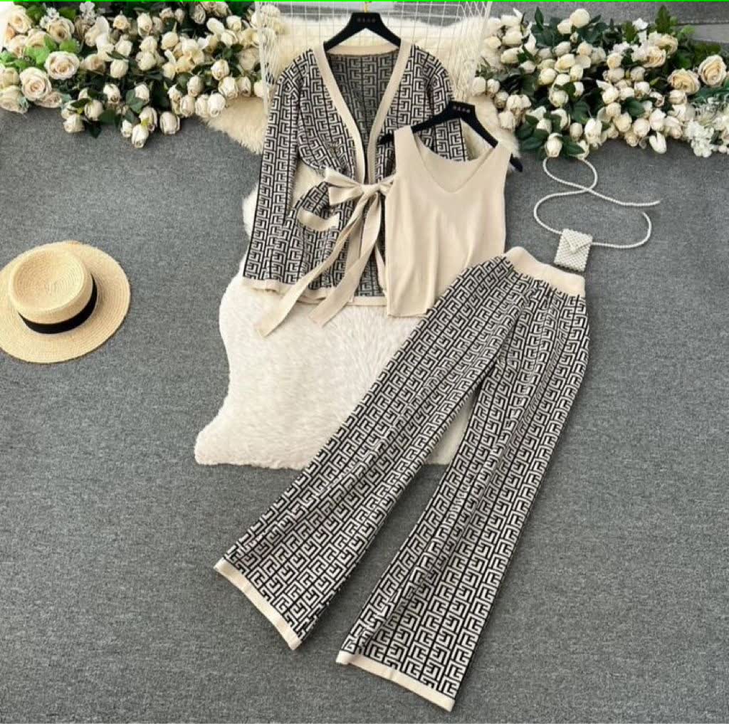 Black-and-cream knit cardigan vest and trousers set, geometric pattern, wide-leg pants