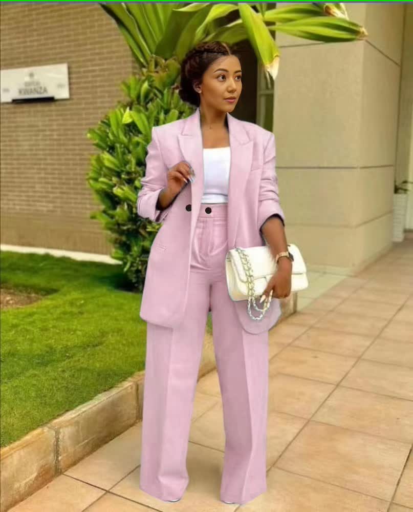 Pale green structured blazer and straight-leg trouser suit set