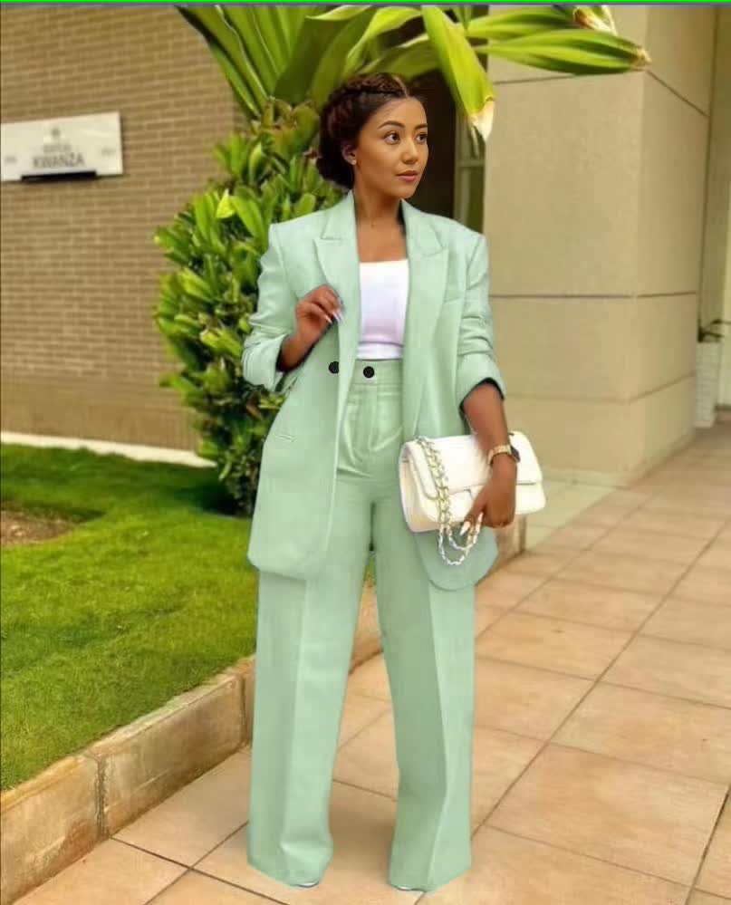 Mint green structured blazer and straight-leg trouser suit set