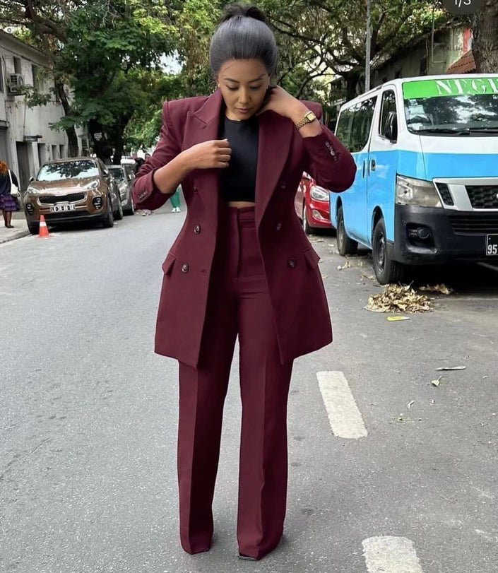 Maroon twin set suit with double-breasted blazer and matching straight-leg trousers