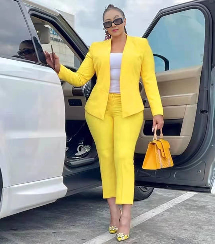 Yellow blazer and trouser set with tailored lapels and matching straight-leg pants