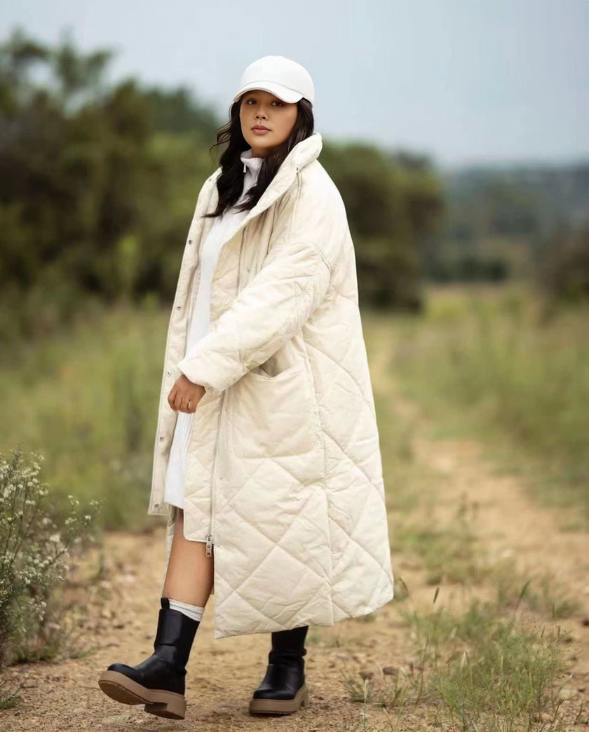Long quilted coat, Cream, hood, button front, diamond quilting, side pockets.