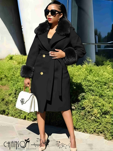 Black long belted coat with wide lapel fur trim and gold button front