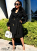 Black belted coat with faux-fur collar and cuffs, gold buttons, mid-length.