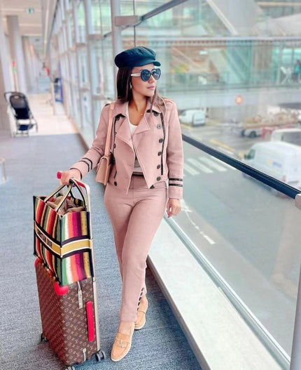 Pink double-breasted jacket and pants twin set with dark button trim