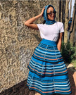 Blue striped maxi skirt set with white top and matching striped headscarf