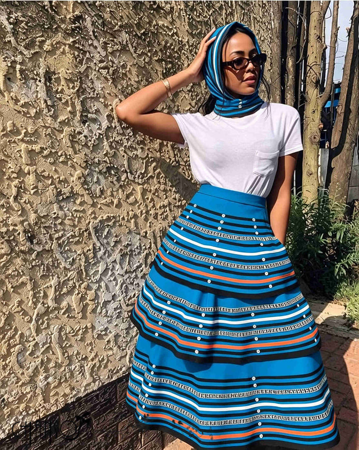 Blue striped maxi skirt set with white top and matching striped headscarf