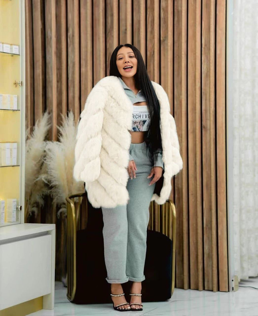 White plush fur coat with long sleeves and open front
