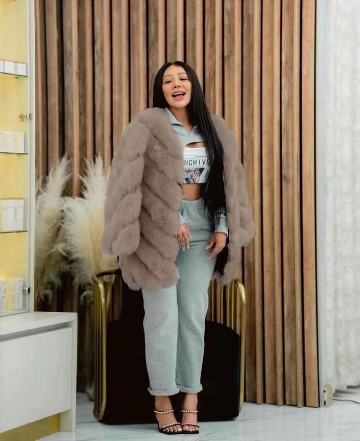 Grey plush fur coat with long sleeves and open front