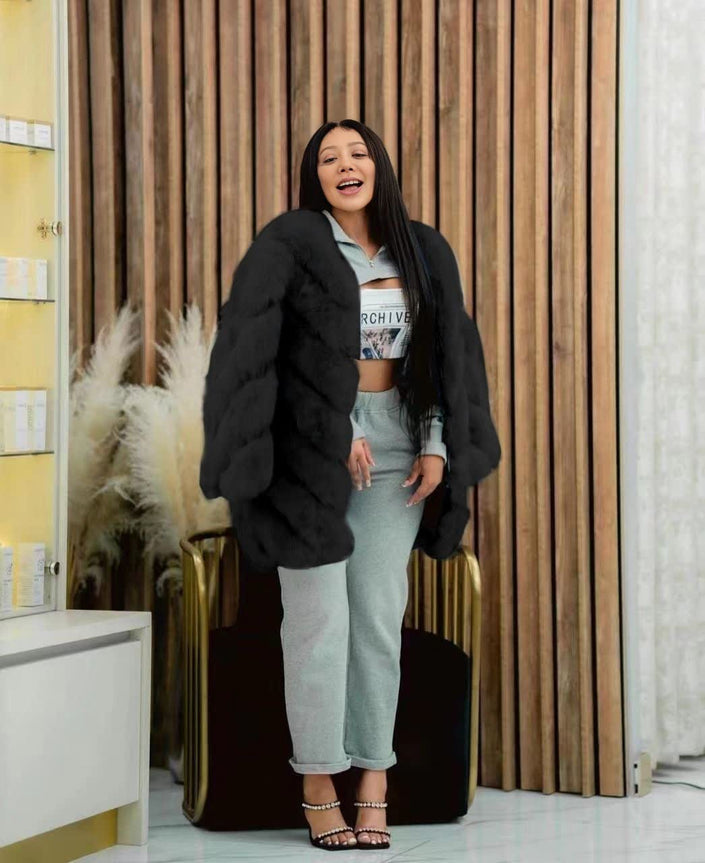 Black plush fur coat with long sleeves and open front