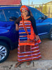 Geometric print maxi skirt set with orange headwrap, black top, long striped skirt