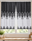 Pair of curtains with black and white damask medallion borders and scalloped trim