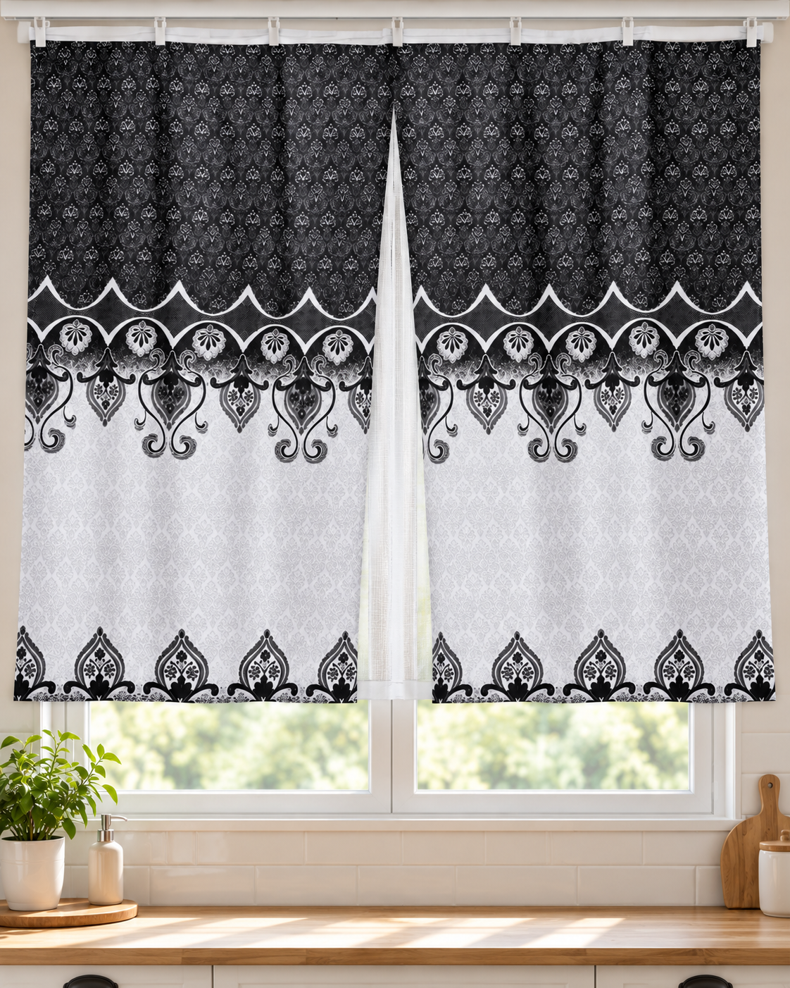 Pair of curtains with black and white damask medallion borders and scalloped trim