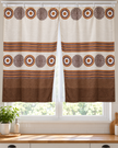 Pair of cream curtains with brown circular motifs, horizontal stripes, and a solid brown hem