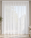 White sheer curtain with pencil pleats and a lightweight open weave