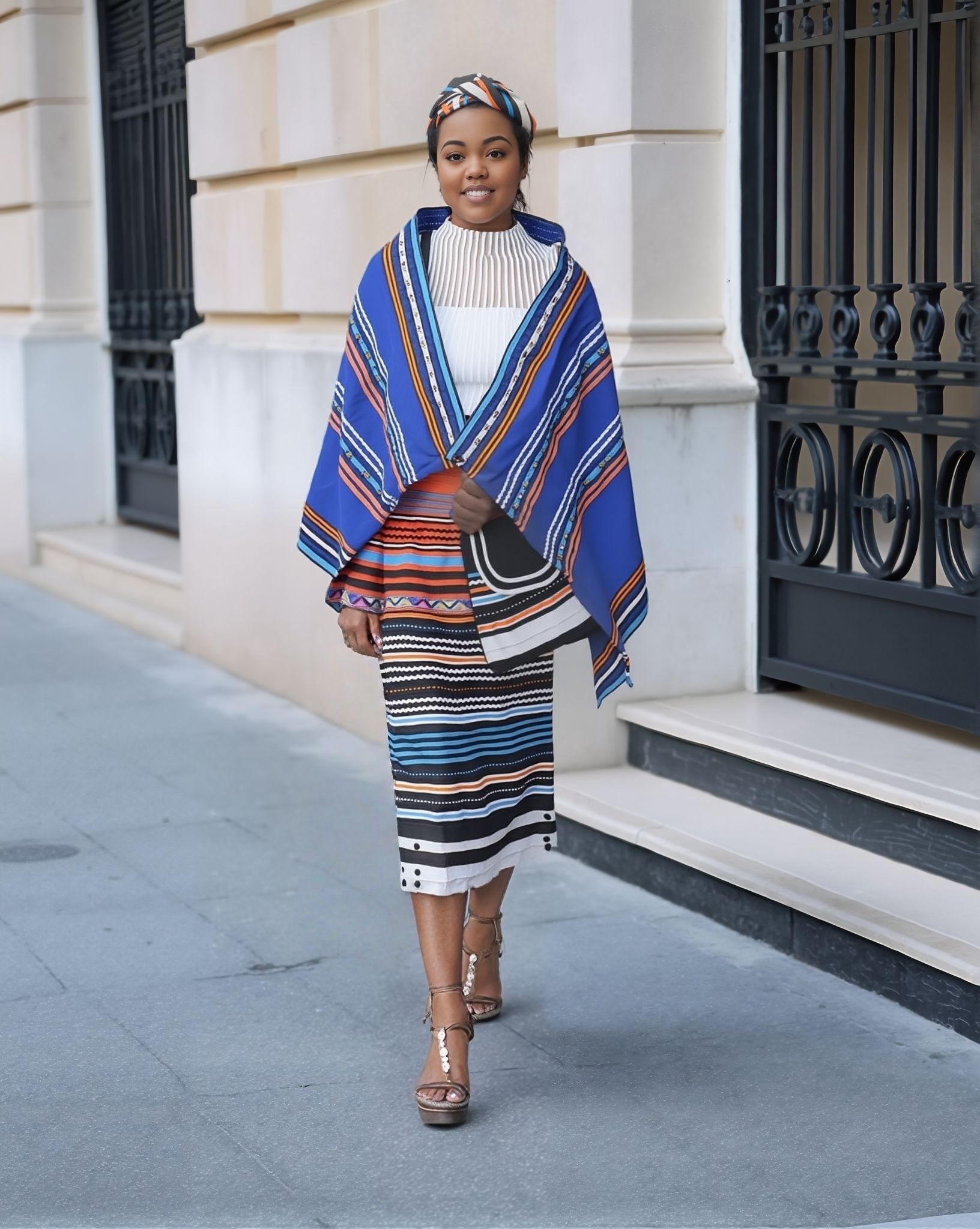 5-piece striped skirt set with blue V-neck top, multicolor striped skirt, and headwrap