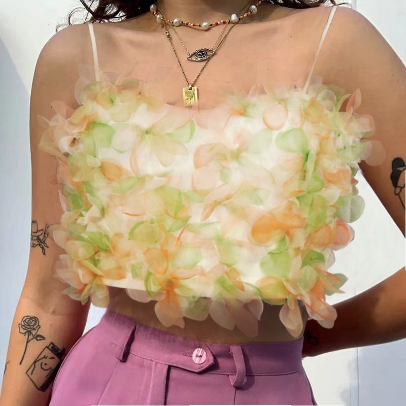 Layered petal crop top with spaghetti straps, pastel orange and green floral ruffles