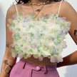 Layered petal crop top with spaghetti straps, pastel green and white floral ruffles