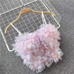 Layered petal crop top on hanger, spaghetti straps, pastel pink floral ruffles