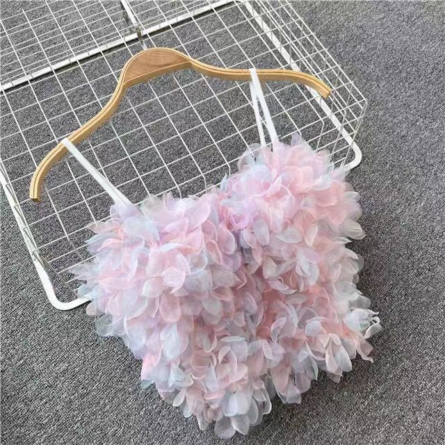 Layered petal crop top on hanger, spaghetti straps, pastel pink floral ruffles