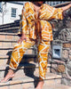 Bold Stripe Print Wide-Sleeve Tie-Waist Blouse with Coordinating Pants