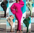 Knitted maxi dress with puff sleeves and a long fitted knit skirt