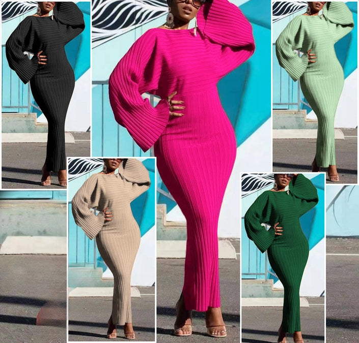 Knitted maxi dress with puff sleeves and a long fitted knit skirt