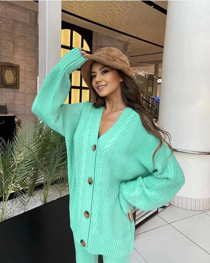 Light green knit cardigan and slim trousers set, button front and ribbed cuffs