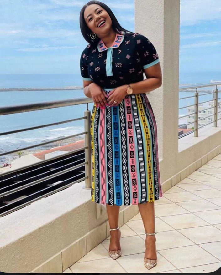 Pleated midi skirt with colorful African-style vertical stripe print