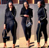 Sporty zippered hoodie paired with striped long pants, perfect for casual athletic wear