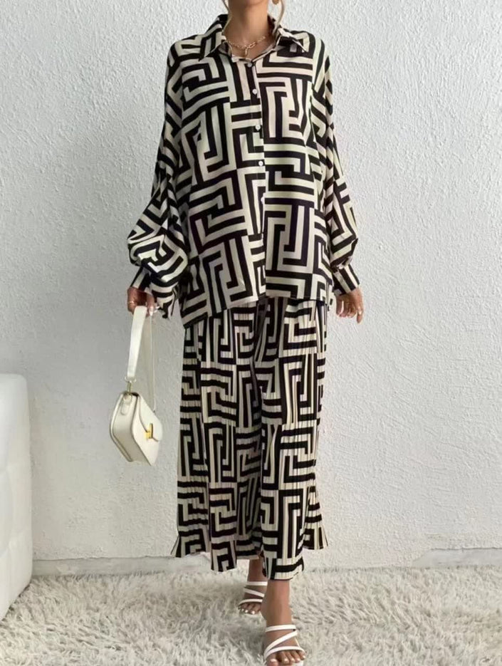Geometric long shirt and pleated wide-leg pants, black and white patterned set