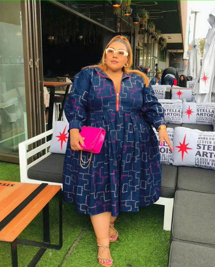 Dark blue plus size zip midi dress with pink geometric print, puff sleeves, flared skirt