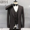 Slim fit plaid suit set with vest and black bow tie on mannequin