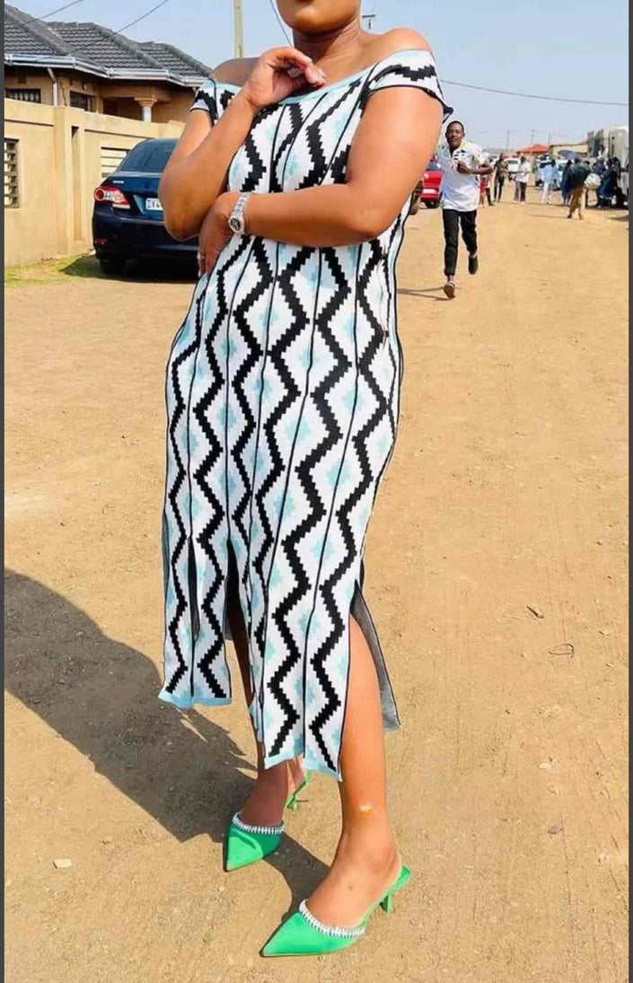 Off-shoulder geometric knit midi dress, white with black and green diamond pattern