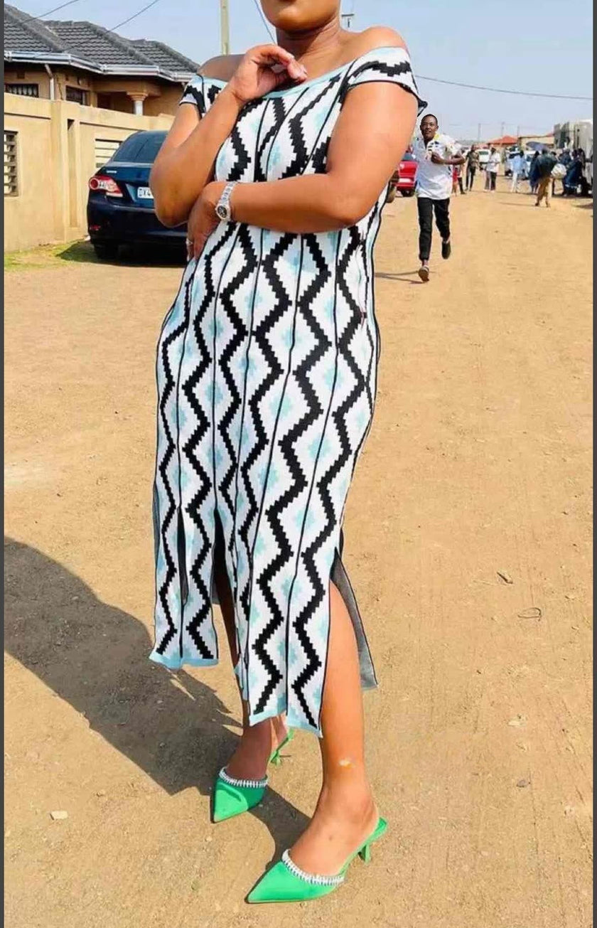 Off-shoulder geometric knit midi dress, white with black and green diamond pattern