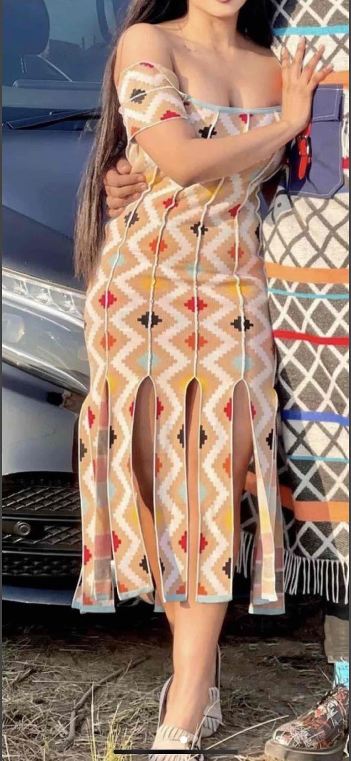 Off-shoulder geometric midi dress, beige with red and navy pattern, fringe hem