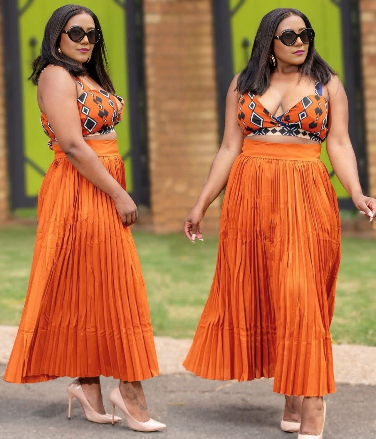 Orange pleated midi skirt with geometric printed wrap-style top, twin set