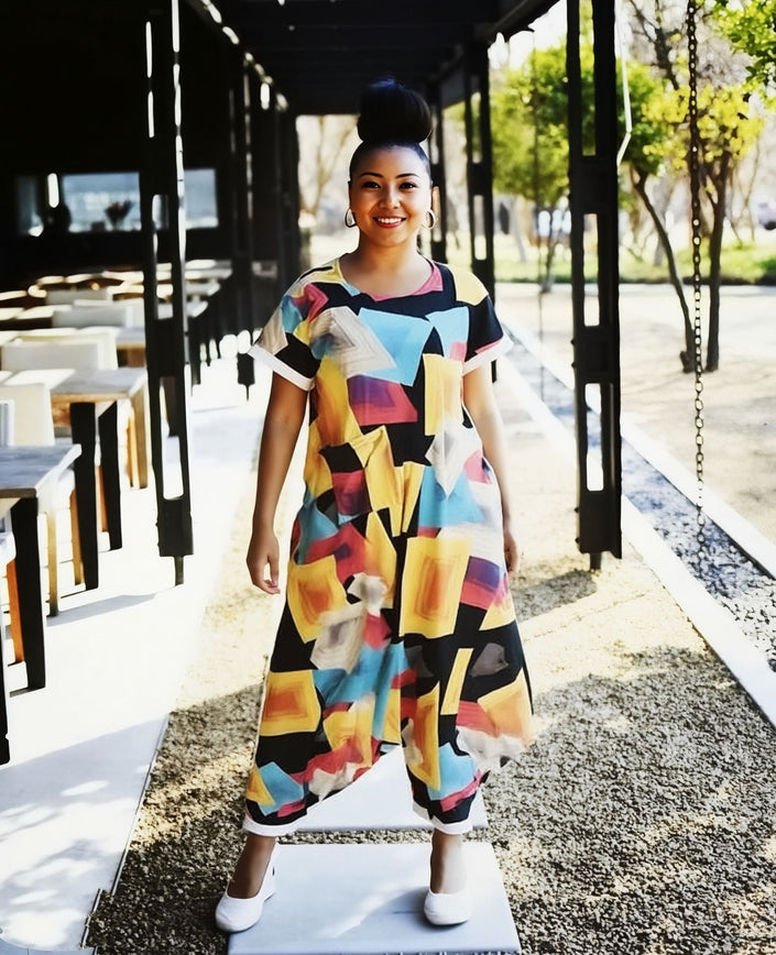 Geometric loose-fit jumpsuit with multicolor square blocks, short sleeves, loose legs