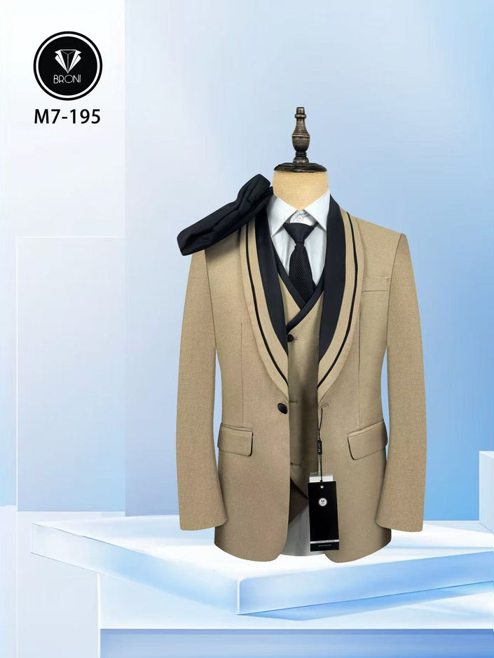 Beige tuxedo suit with black shawl lapel, matching vest and tie, three-piece set